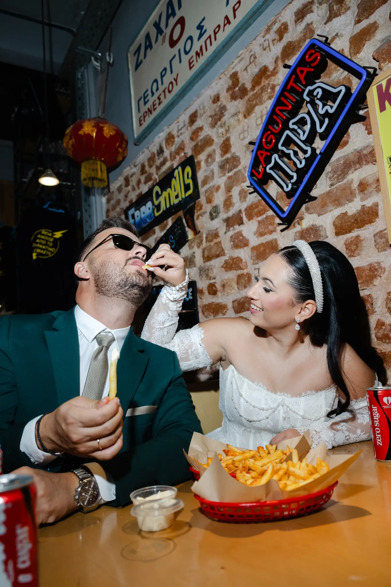 Couple laughing together during the wedding meal